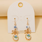 Bow And Blue Floral Ceramic Charms Dangle Earrings