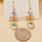 Bow And Pink Floral Ceramic Charms Dangle Earrings